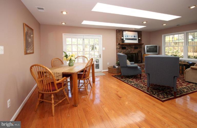 5631 Inverchapel Road Springfield, VA 22151 - Photo 8 of 30 a dining room with furniture and wooden floor