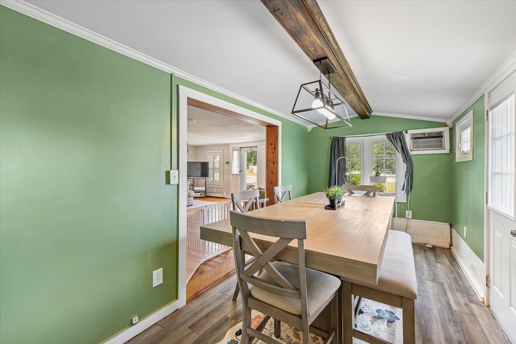 125 Fair Oak Road Springfield, MA 01128 - Photo 11 of 29 a view of a dining room with furniture window and wooden floor