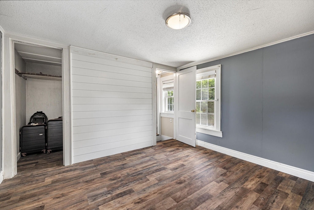 125 Fair Oak Road Springfield, MA 01128 - Photo 21 of 29 an empty room with wooden floor closet and windows