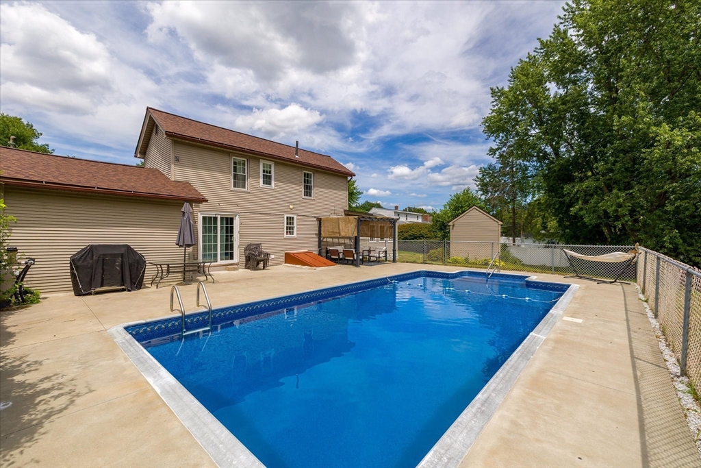 125 Fair Oak Road Springfield, MA 01128 - Photo 25 of 29 a view of a swimming pool with a patio