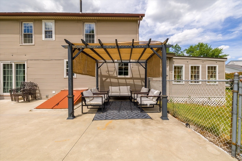 125 Fair Oak Road Springfield, MA 01128 - Photo 27 of 29 a view of a house with backyard and sitting area
