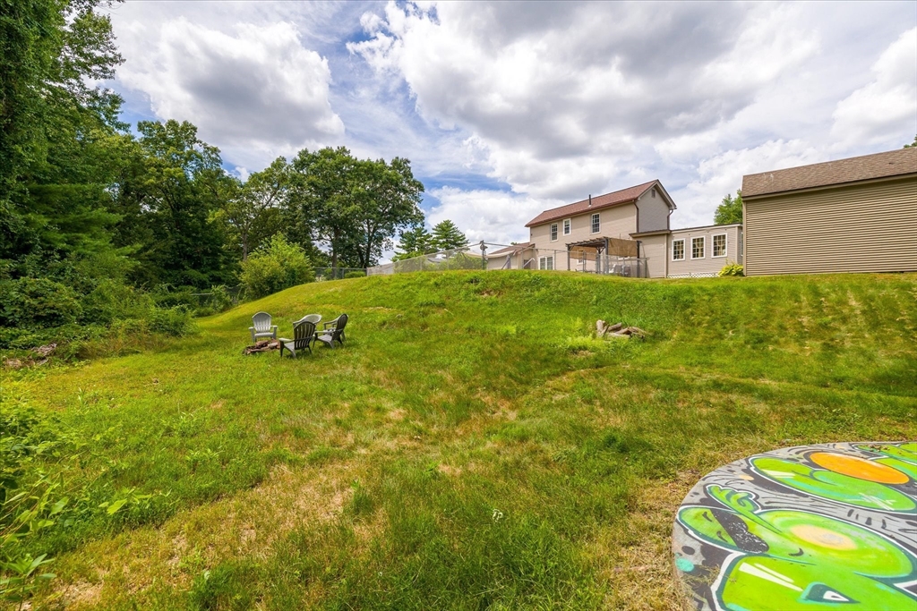 125 Fair Oak Road Springfield, MA 01128 - Photo 28 of 29 a view of an house with backyard space and balcony