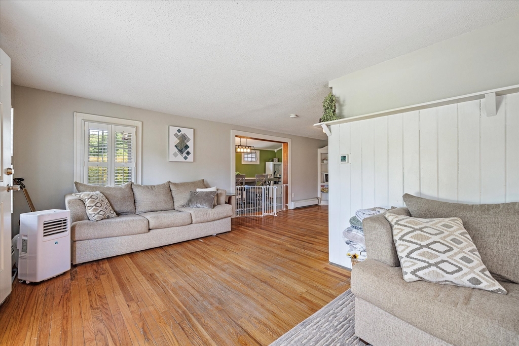 125 Fair Oak Road Springfield, MA 01128 - Photo 5 of 29 a living room with furniture and a wooden floor