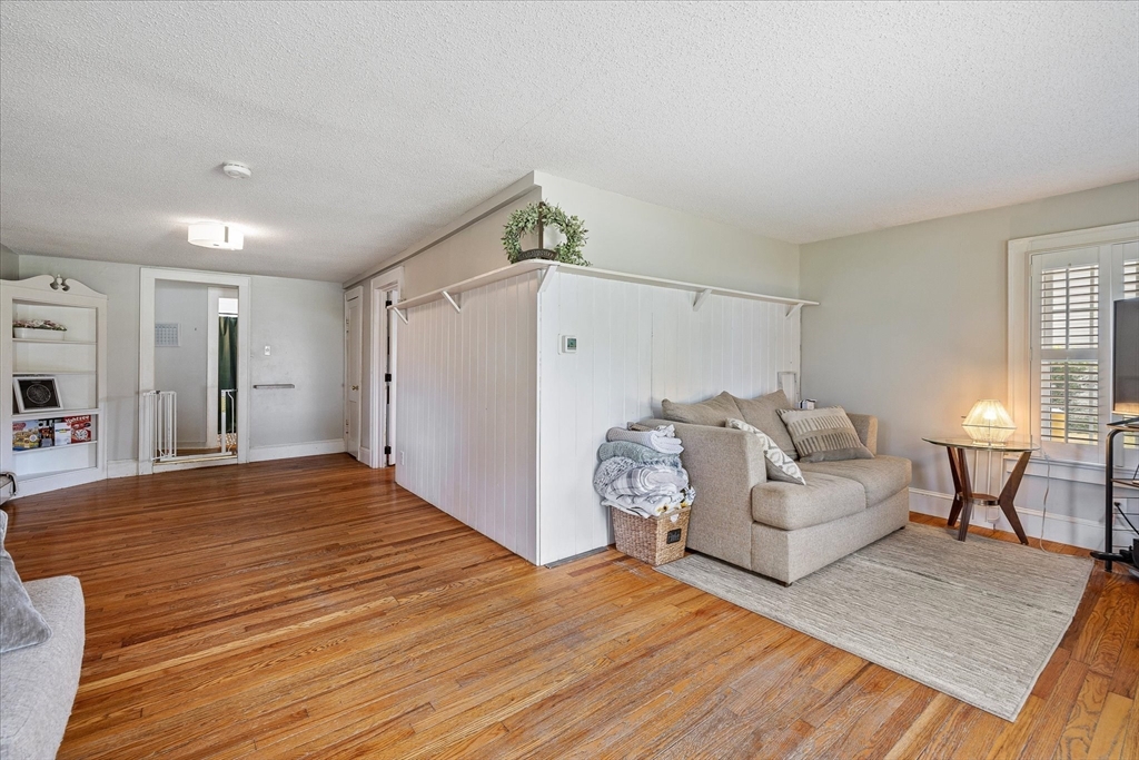 125 Fair Oak Road Springfield, MA 01128 - Photo 6 of 29 a living room with furniture and a wooden floor