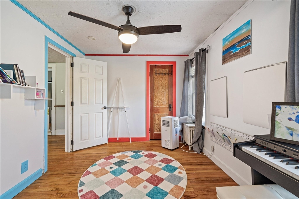 125 Fair Oak Road Springfield, MA 01128 - Photo 10 of 29 a bedroom with furniture and a window