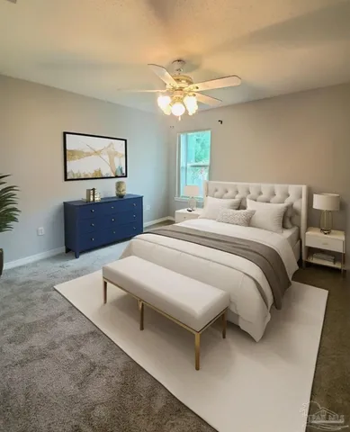 a bedroom with a bed and a dresser