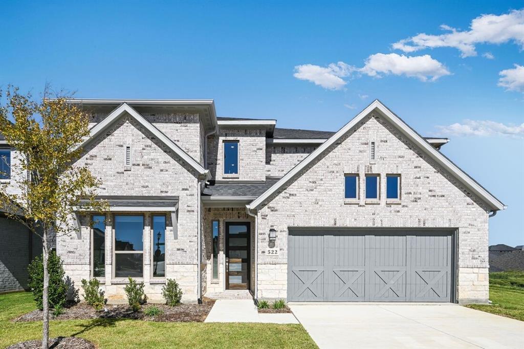 522 Bull Street Oak Point, TX 75068 - Photo 1 of 36 a front view of a house with garden