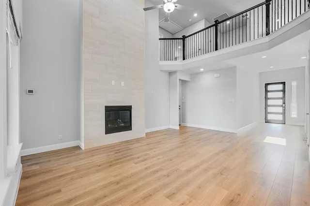 a view of an entryway with wooden floor