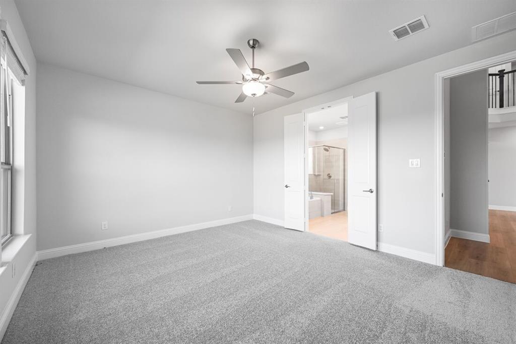 522 Bull Street Oak Point, TX 75068 - Photo 10 of 36 a view of an empty room with a window