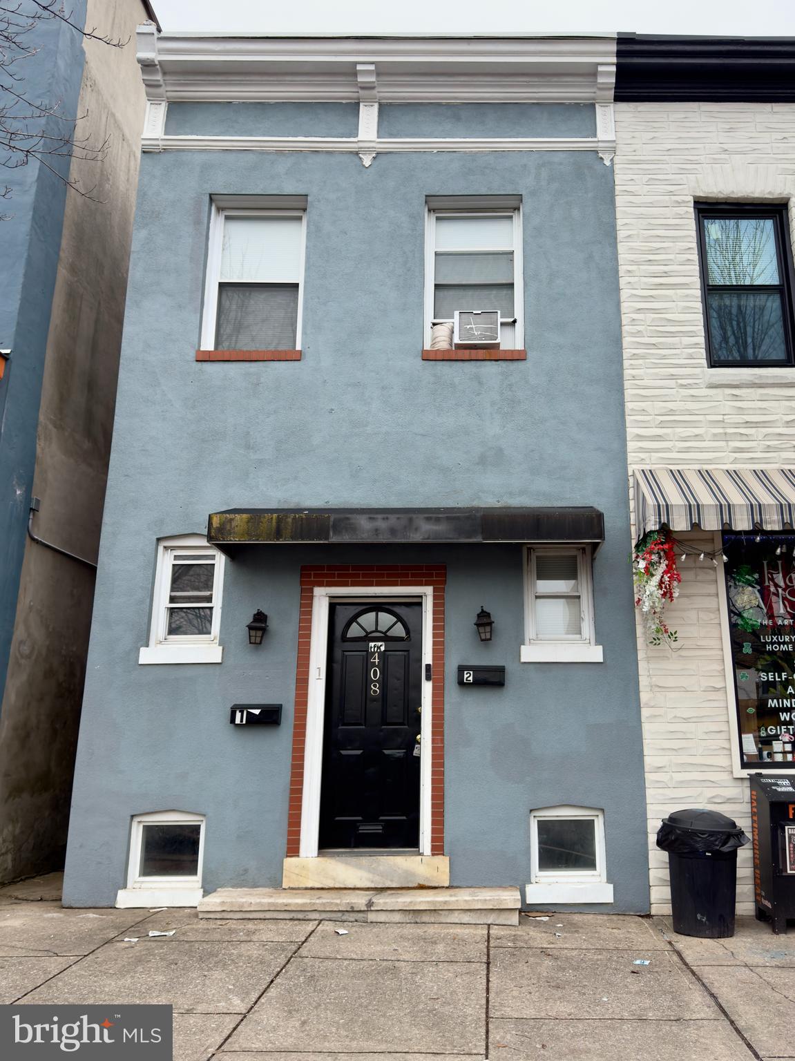 408 South Conkling Street, Unit 1 Baltimore, MD 21224 - Photo 1 of 14 a front view of a house