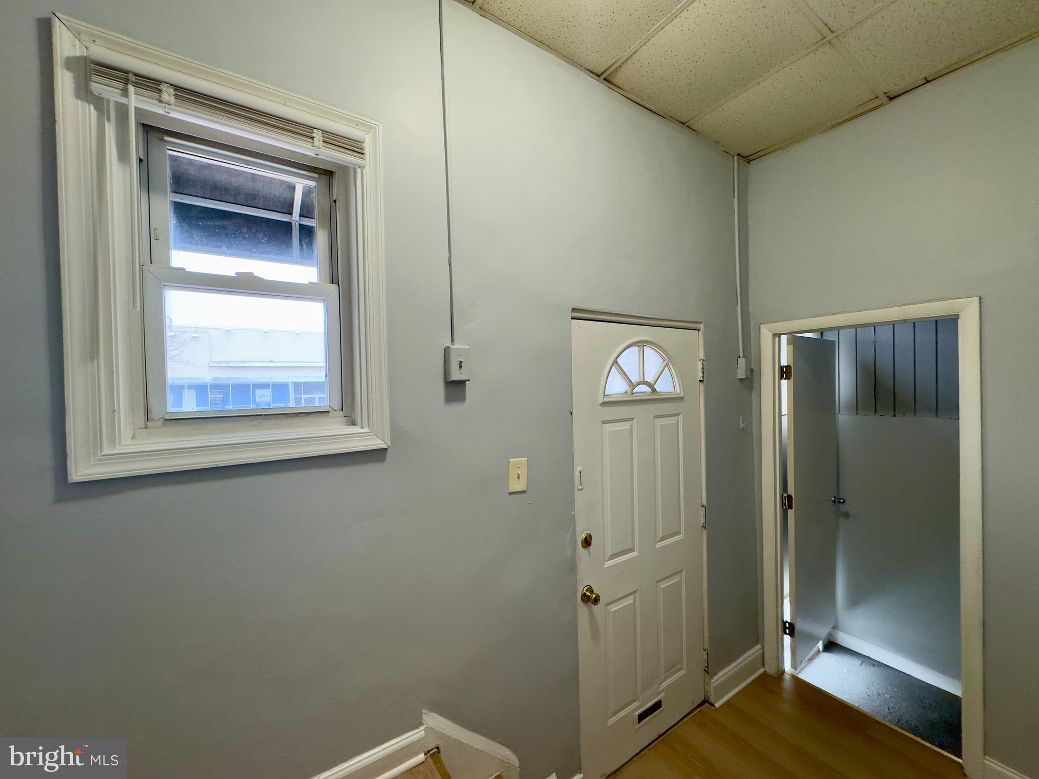 408 South Conkling Street, Unit 1 Baltimore, MD 21224 - Photo 2 of 14 a bathroom with a shower and a mirror