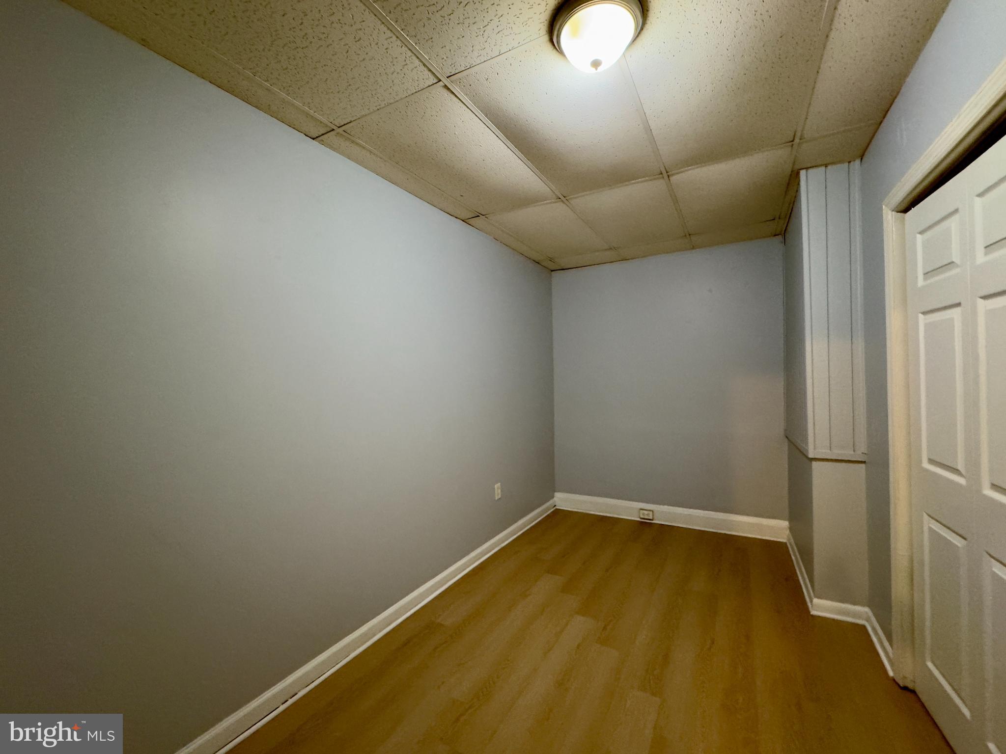 408 South Conkling Street, Unit 1 Baltimore, MD 21224 - Photo 7 of 14 a view of a room with a projector