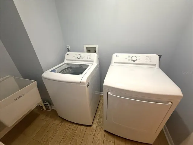 a utility room with dryer and washer