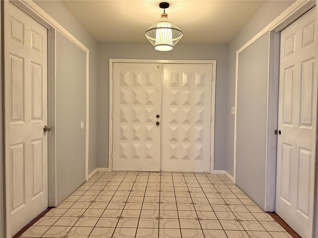 8840 Martinique Lane Port Richey, FL 34668 - Photo 3 of 31 a view of an empty room with window
