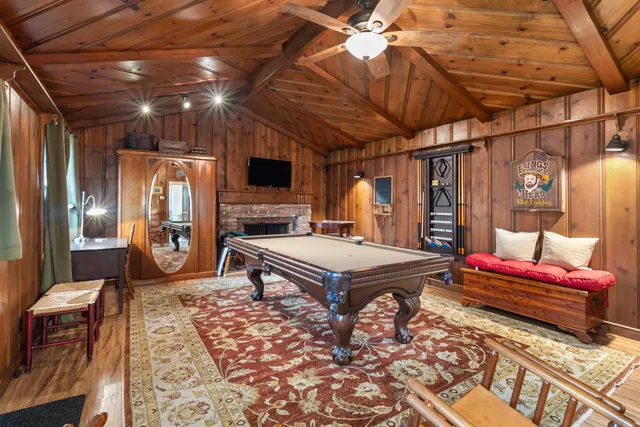 a view of house with a yard