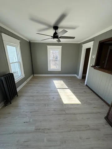 a view of an empty room and window