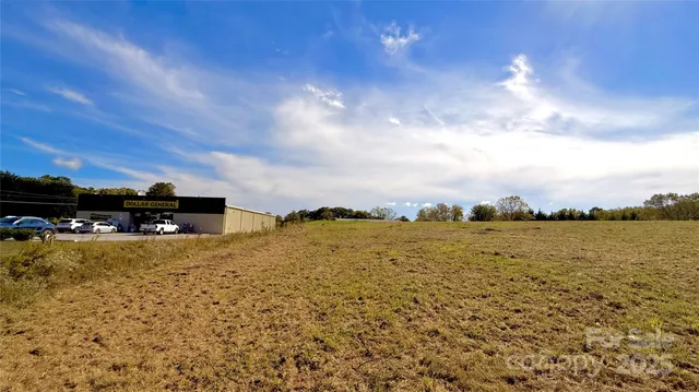 a view of a lake with sunset
