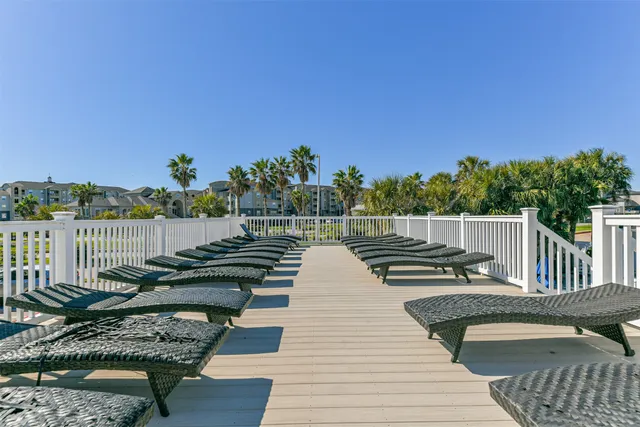 a view of a roof deck with couches