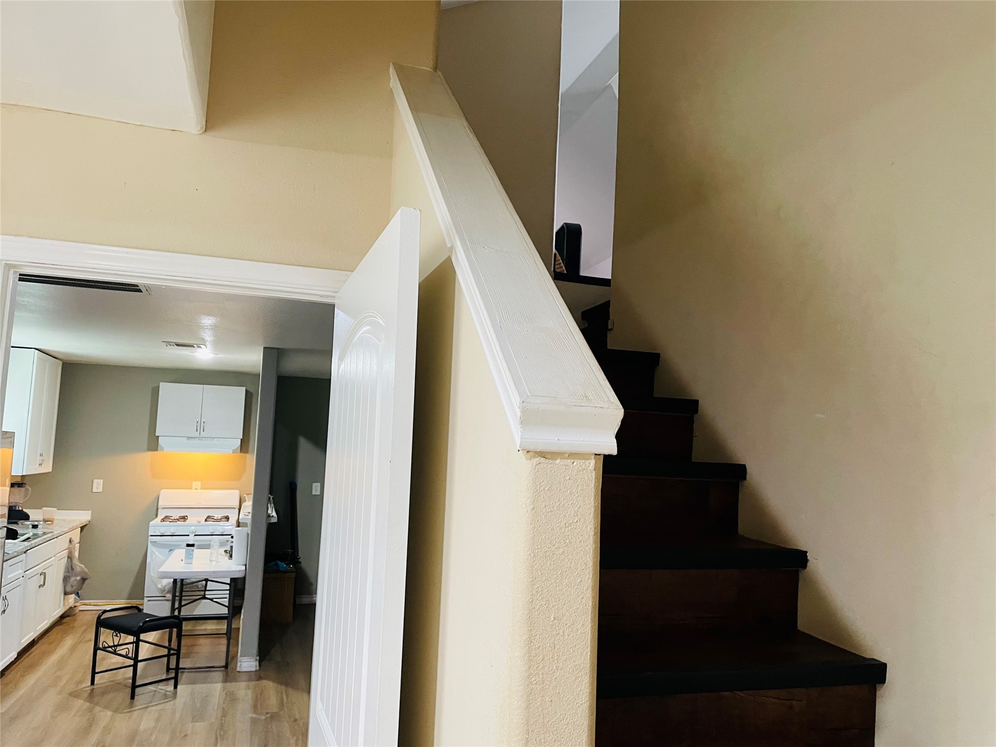 76 County Road 3540 Cleveland, TX 77327 - Photo 19 of 26 a view of entryway and hall with wooden floor