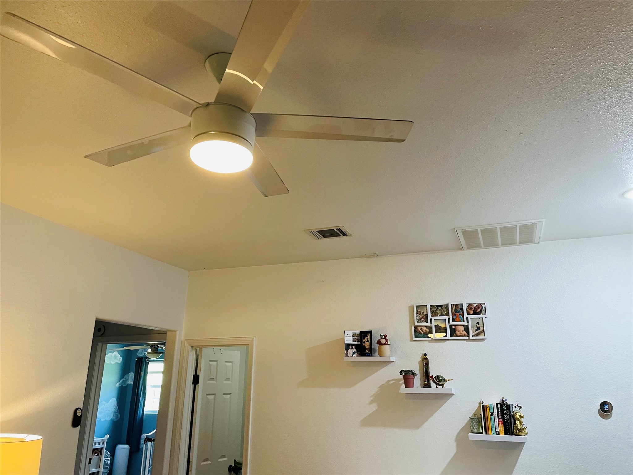 76 County Road 3540 Cleveland, TX 77327 - Photo 21 of 26 a bathroom with a bathtub and a shower