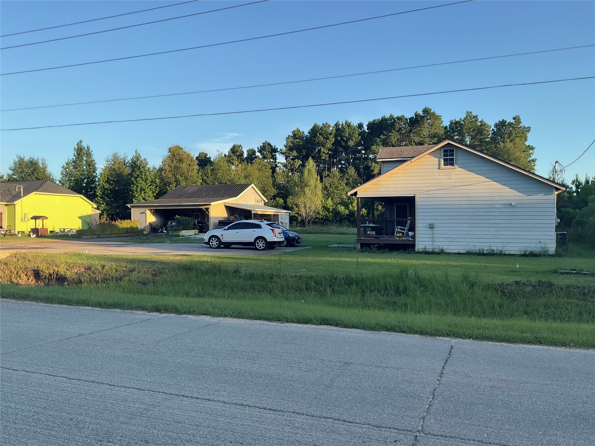76 County Road 3540 Cleveland, TX 77327 - Photo 3 of 26 a view of outdoor space and yard