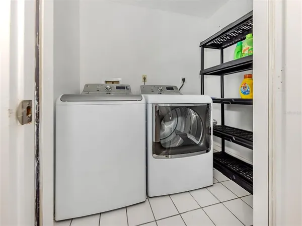 a utility room with washer and dryer