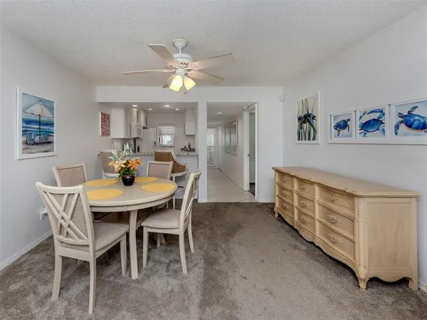 a view of a dining room with furniture