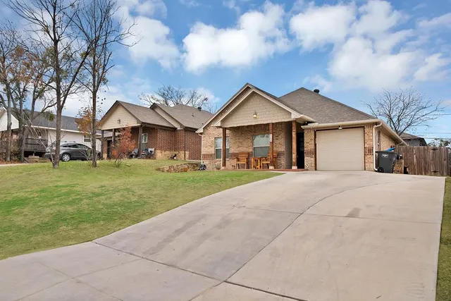 a view of house with garden