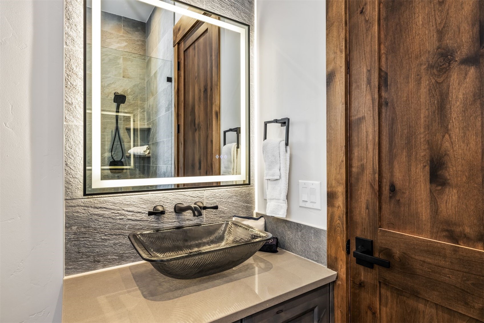 99 Independence Lane Keystone, CO 80435 - Photo 26 of 50 a bathroom with a sink and a mirror