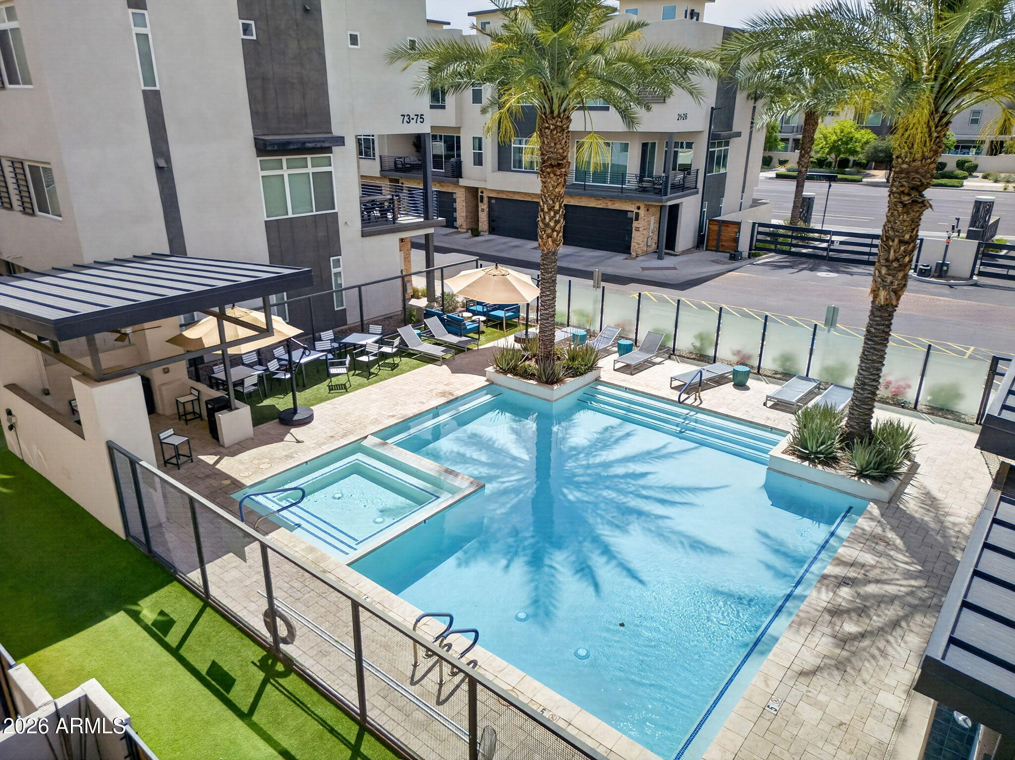 6850 East McDowell Road, Unit 14 Scottsdale, AZ 85257 - Photo 41 of 48 Community Pool & Lounge Area