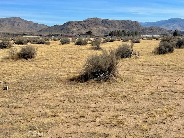 0 Ramona Road San Bernardino, CA 92411 - Photo 13 of 17 a view of a lake with mountains in the background