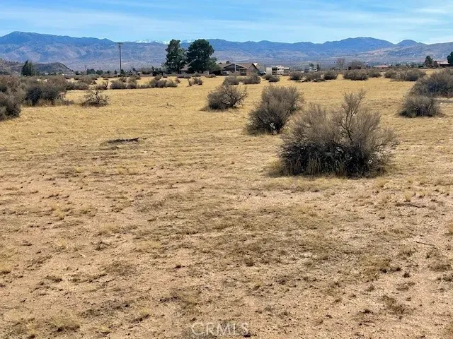 a view of lake with mountain