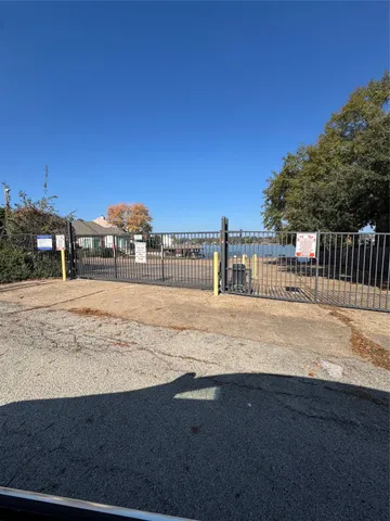 a view of street with ocean