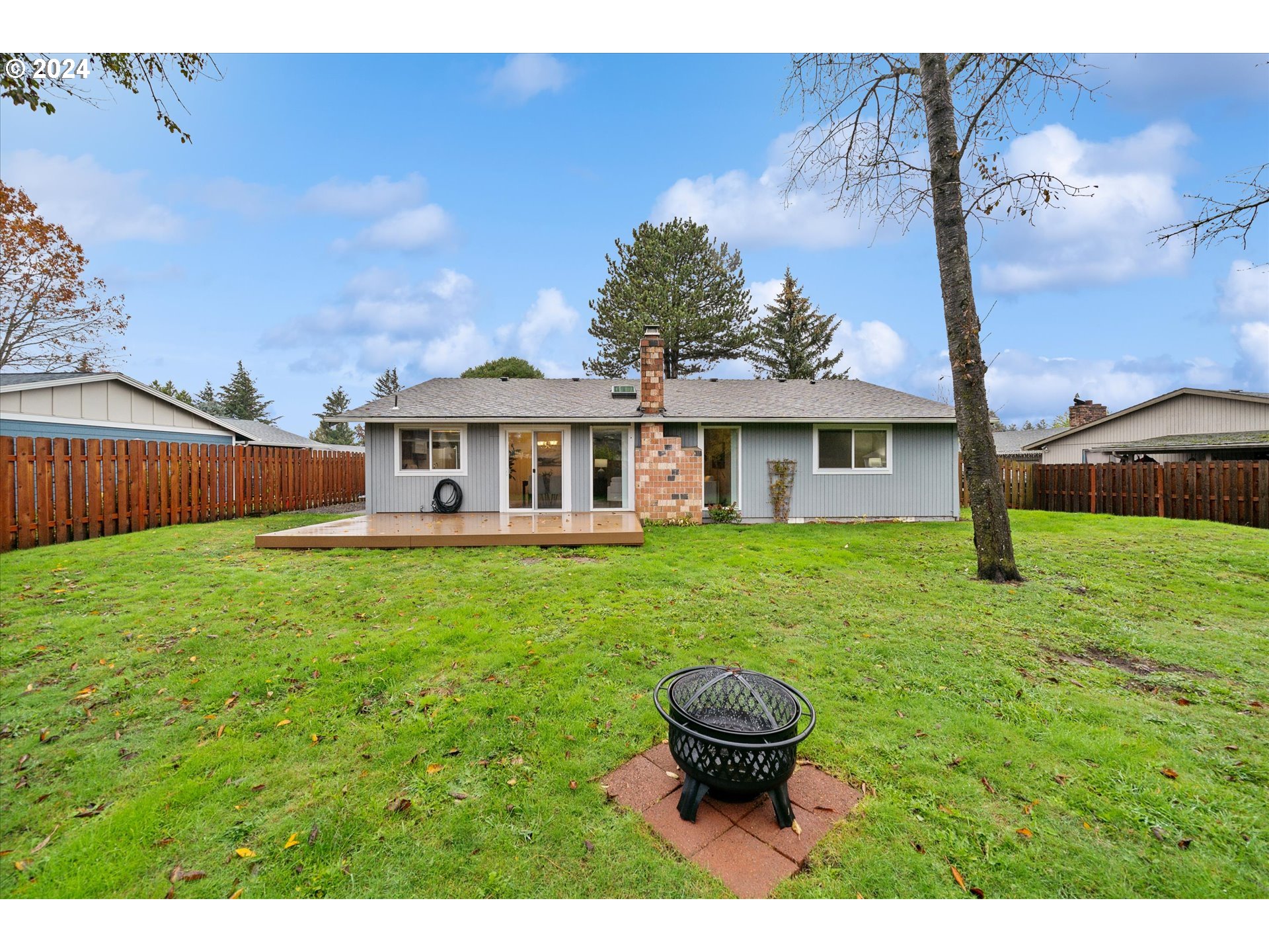 2144 Northeast 38th Drive Gresham, OR 97030 - Photo 20 of 23 a view of an house with backyard space and garden