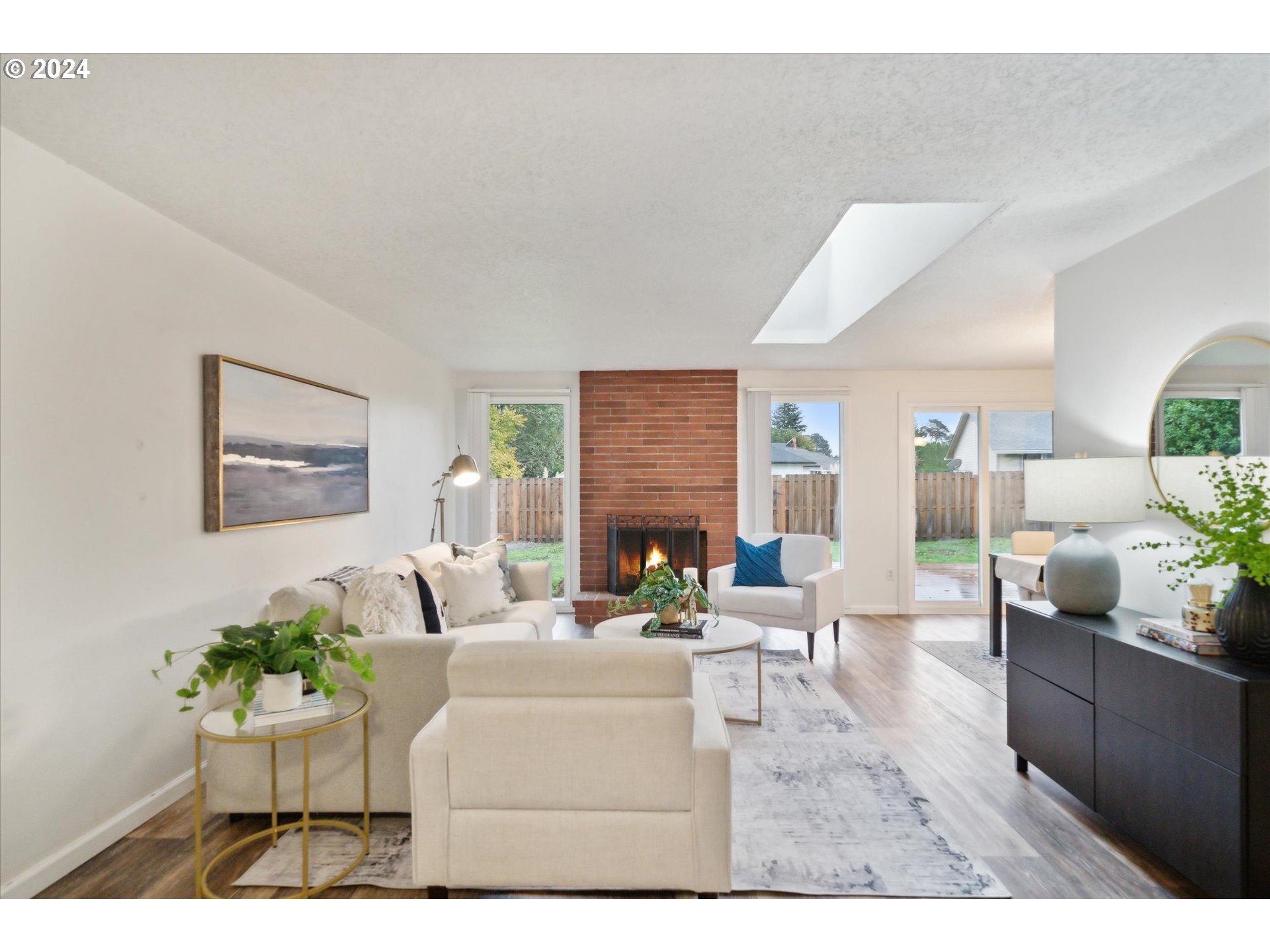 2144 Northeast 38th Drive Gresham, OR 97030 - Photo 2 of 23 a living room with furniture flowerpot and a fireplace