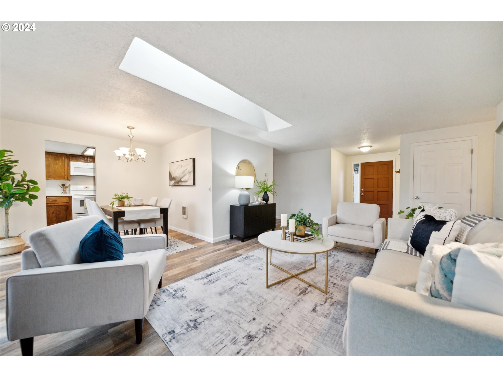 2144 Northeast 38th Drive Gresham, OR 97030 - Photo 4 of 23 a living room with furniture and wooden floor