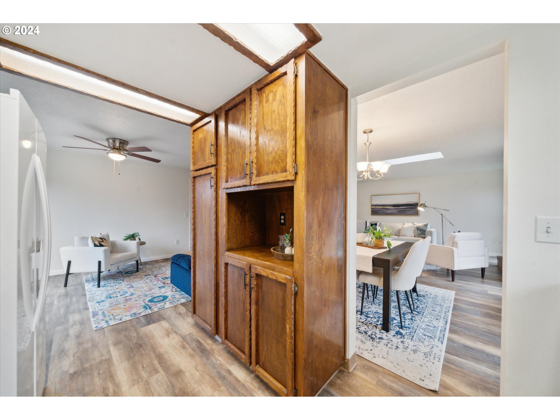 2144 Northeast 38th Drive Gresham, OR 97030 - Photo 8 of 23 a living room with furniture and a flat screen tv