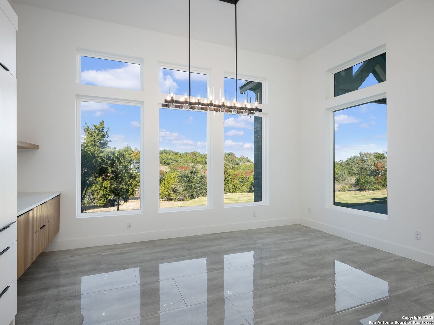 10907 Nina Ridge San Antonio, TX 78255 - Photo 14 of 54 a very nice looking room with a window