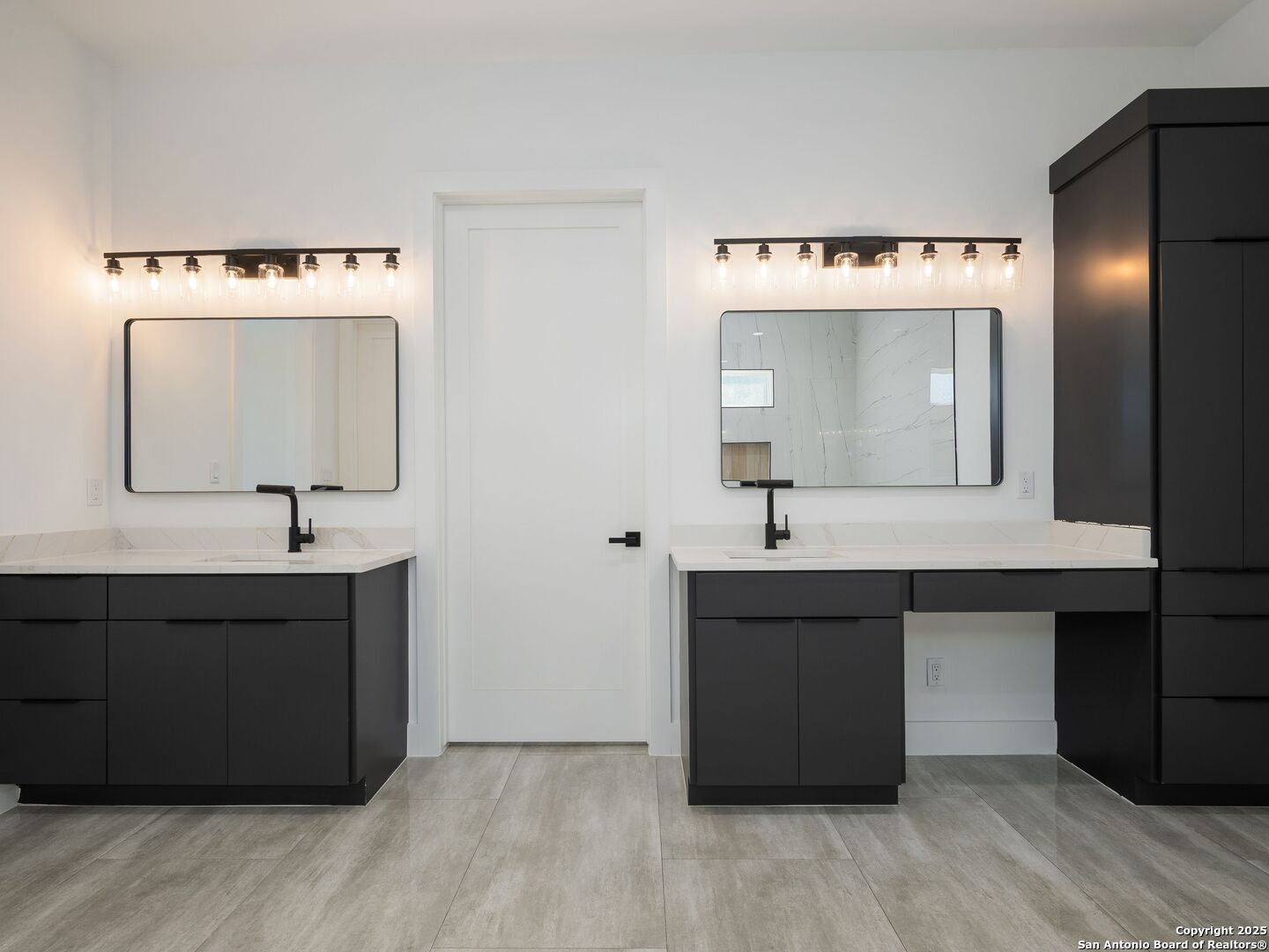 10907 Nina Ridge San Antonio, TX 78255 - Photo 24 of 54 a bathroom with a sink vanity and mirror