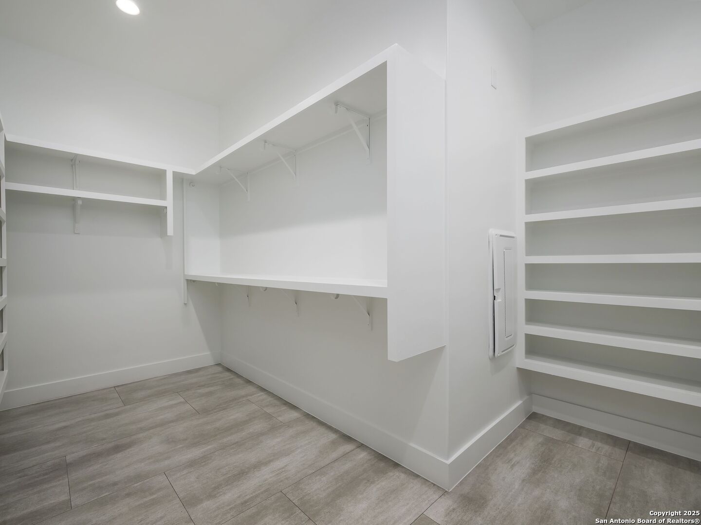 10907 Nina Ridge San Antonio, TX 78255 - Photo 26 of 54 a view of an empty walk in closet