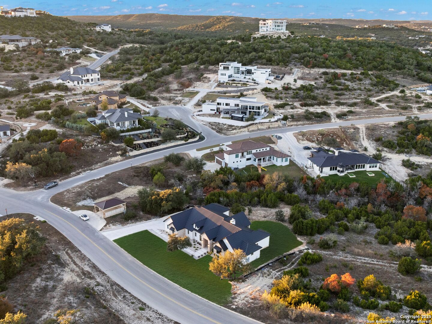 10907 Nina Ridge San Antonio, TX 78255 - Photo 51 of 54 an aerial view of residential houses with outdoor space