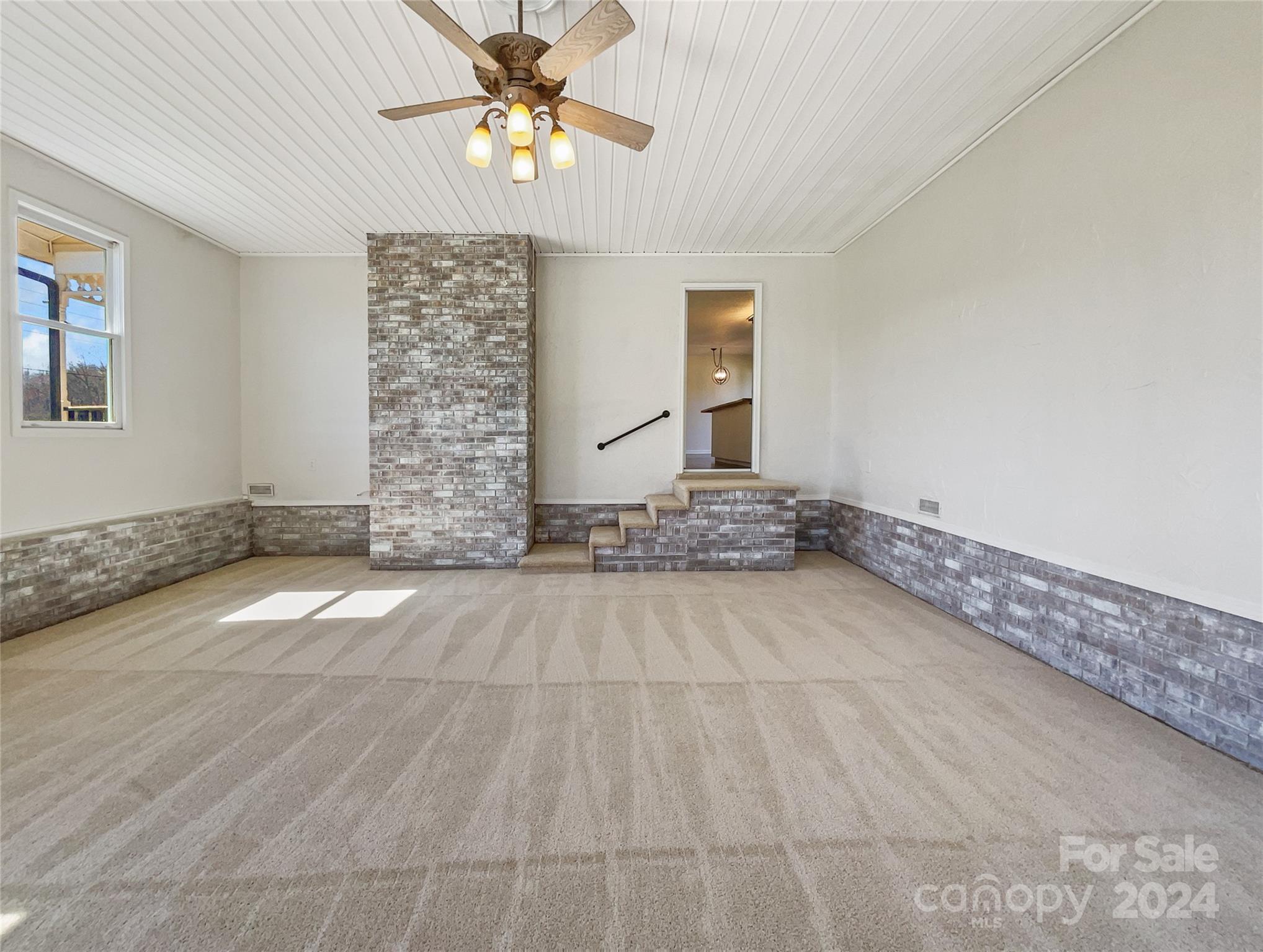 1412 Tot Dellinger Road Cherryville, NC 28021 - Photo 7 of 19 a view of empty room with ceiling fan