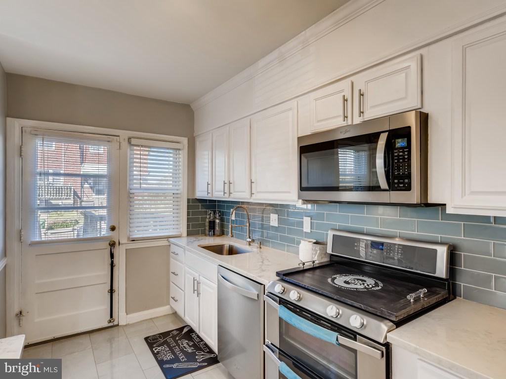 3708 Raspe Avenue Baltimore, MD 21206 - Photo 5 of 11 Gourmet Kitchen with Stainless Steel Appliances