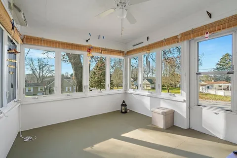 a large white room with a large window