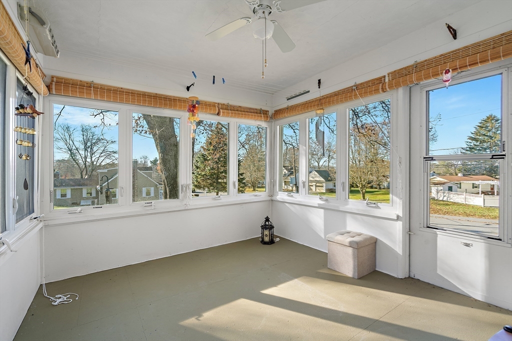 16 Beaudry Street Marlborough, MA 01752 - Photo 12 of 40 a large white room with a large window