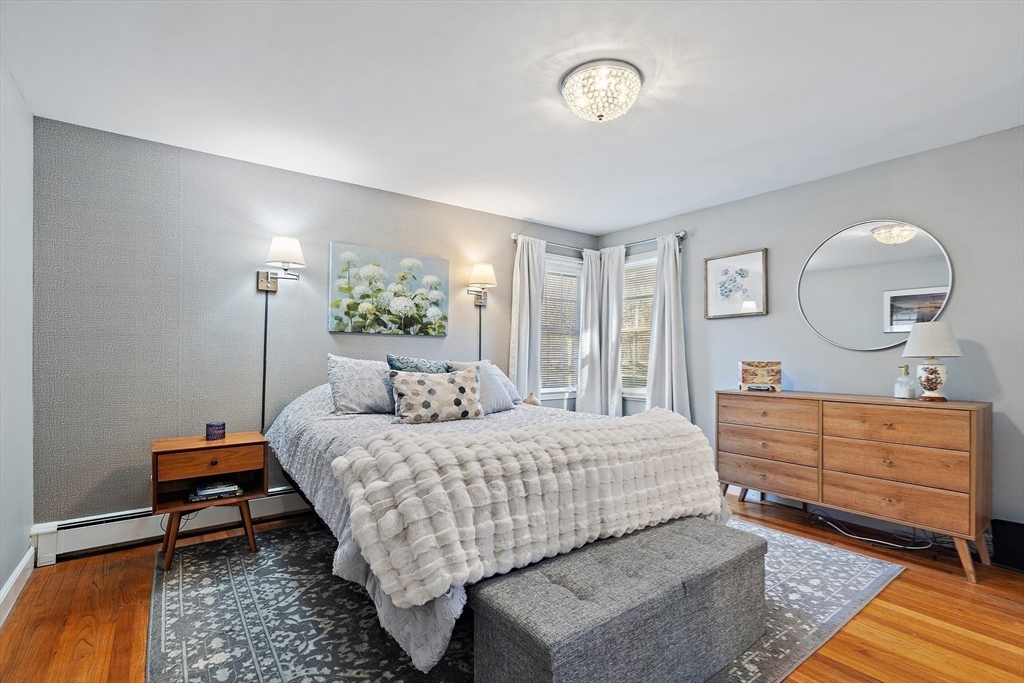 16 Beaudry Street Marlborough, MA 01752 - Photo 13 of 40 a bedroom with a bed and a dresser