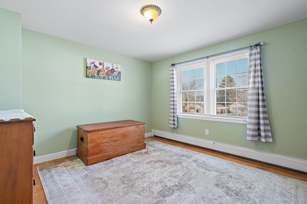 16 Beaudry Street Marlborough, MA 01752 - Photo 20 of 40 a view of room with window and wooden floor
