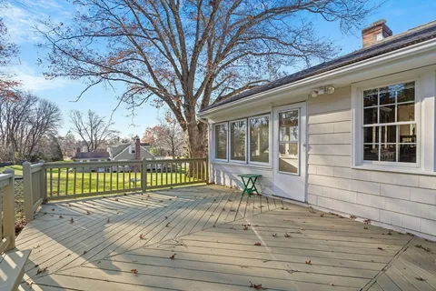 a view of house with outdoor seating space