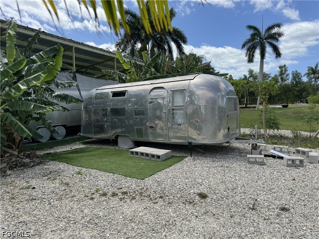 13641 Ficus Tree Lane Bokeelia, FL 33922 - Photo 28 of 33 a view of backyard with green space