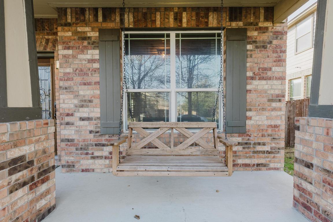 1420 Crested Butte Way Georgetown, TX 78626 - Photo 2 of 40 Front porch swing